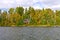 House on a remote lake in the fall