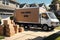 House Removal Truck Packed with Labeled Cardboard Boxes - Delicate Glassware Peeking Out, Furniture Safely Stowed