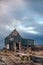 House on the rocky shore and dogs. Greenland Dogs resting in Rodebay settlement. The Greenland Dog s Greenland Husky is a large