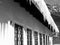 House roof with icicles in black and white