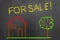 House for sale colorful chalk drawing on chalkboard or blackboard.