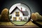 House searching, magnifying glass looking at house model, real estate concept