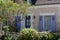 House with shutters in the picturesque village of Chedigny in the Loire Valley, central France.