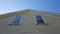 House siding with windows and mud wasp nests