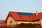 House with solar panels on the roof for water heating