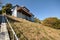 House on a steep hill with stilts