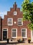 House with stepped gable in old fortified town of Woudrichem, Ne