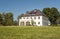 House surrounded by meadows