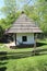 House with thatched roof in Dimitrie Gusti National Village Museum in Bucharest