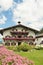 House in Tyrol with beautiful flowers on balcony