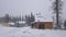 House in the woods in the mountains at winter weather. Nature in winter. Landscape panorama. Sheregesh, Siberia.
