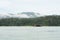 Houseboat cruising through the lake with mountain view at Kenyir Lake. Tasik Kenyir is a man made lake