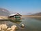 Houseboat and fishing boat in Thailand lake