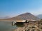 Houseboat and fishing boat in Thailand lake