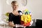 Housecleaning, woman holding bucket with detergent