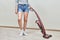 Household cleaning with help of upright vacuum cleaner