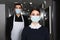 housekeepers in uniform and medical masks