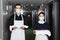 housekeepers in uniform and medical masks