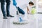 Housekeeping and cleaning concept, Young couple in blue rubber g