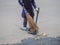 Housekeeping staff Sweeping leaves.