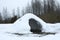 Housem eskimos igloo or yurt made by children from snow in a thaw in winter day