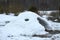 Housem eskimos igloo or yurt made by children from snow in a thaw in winter day