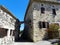 Houses with an arch in the medieval village of Rochemaure, France