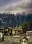 Houses below the mountain