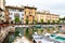 Houses, boats on the dock. Garda. Italy