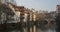 Houses and a bridge reflected in a river in the old town of Nuremberg seen from Henkersteg covered bridge across Pegnitz river