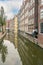 Houses on the Canal of Amsterdam in an Industrial Area