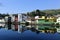 Houses and churches reflected in the blue waters