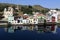 Houses and churches reflected in the blue waters