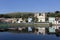 Houses and churches reflected in the blue waters