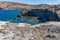 Houses, cliffs and mountains in Papafragas beach