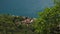 Houses on the coast. View from the mountain to the house on the