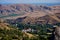 Houses in the countryside among the trees next to the low mountains are rugged roads and similar to the Egyptian