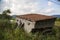 Houses damaged by ground erosion on Tara mountain