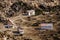 Houses with glacial traces on yellow stone ground at Thangu and Chopta valley in winter in Lachen. North Sikkim, India