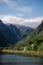 houses and green trees near majestic mountains Gudvangen