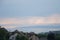 Houses and Greenery besides Lake Geneva at Sunset