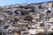 Houses on the mountainside white