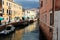 Houses over canal in Venice before storm