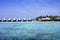 Houses over transparent quiet sea water- tropical paradise, Maldives