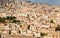 Houses packed in the old town of Modica, in Sicily