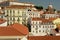 Houses, palace and pantheon on a hill slope of lisbon