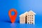 Houses and red navigation pointer pin. location of residential buildings or work, city orientation. Checking the location of a new