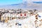 Houses with snow roofs panorama in Bansko, Bulgaria