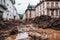 houses and the street are filled with mud after the mudflow