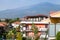 Houses on street in Giardini Naxos and Etna mount